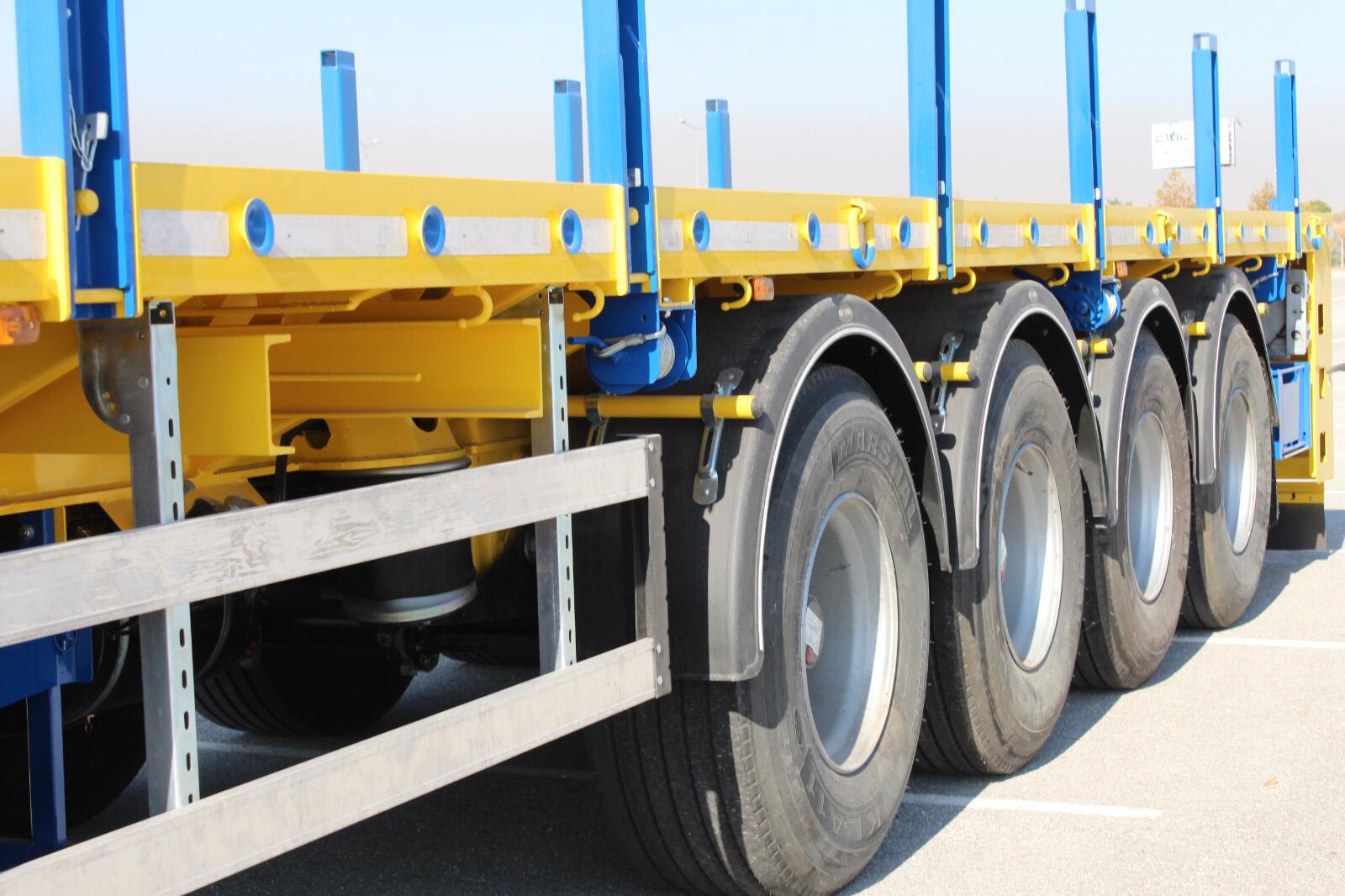 Flatbed trailer rear view loaded with goods