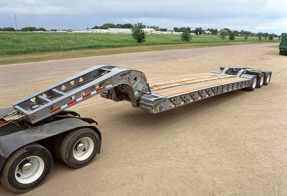 Heavy machinery transported on lowbed