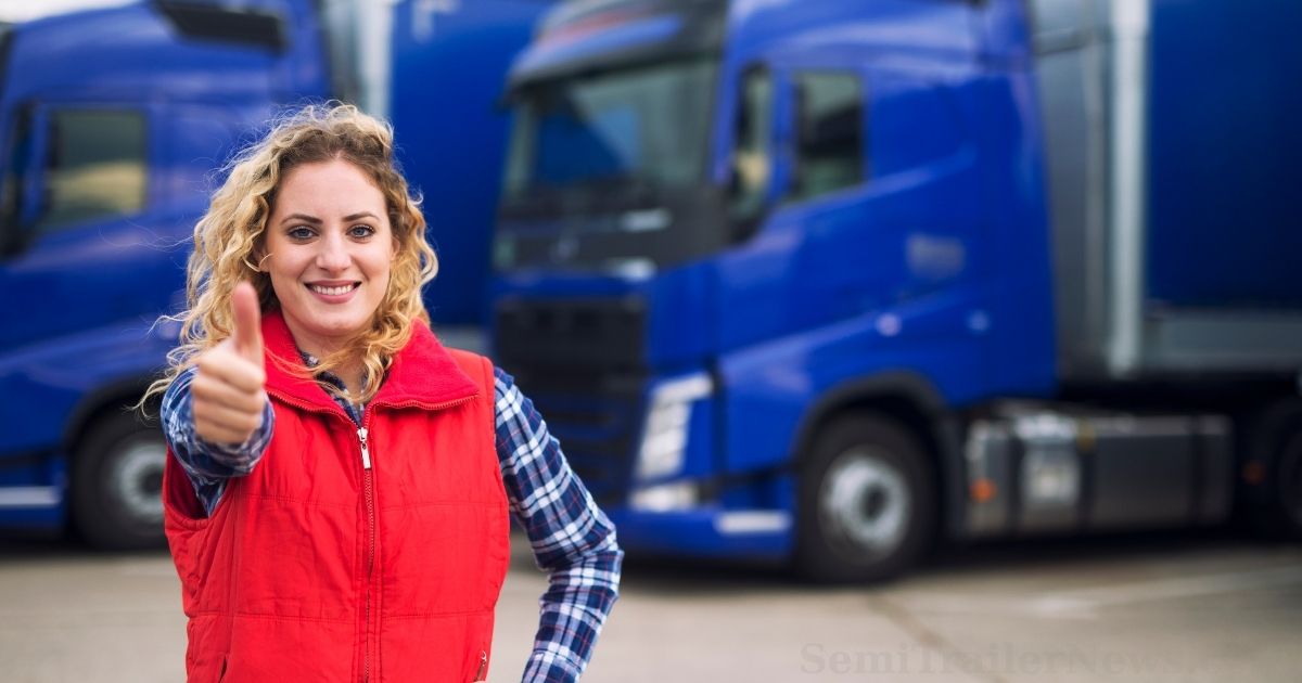 Female truck driver performing safe driving procedures