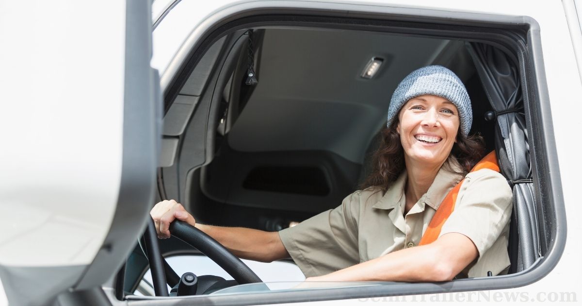 Modern female truck driver handling electronic cabin controls